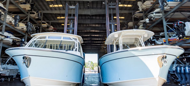 Two boats in the MarineMax Pensacola warehouse