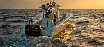 Boat sailing into the sunset