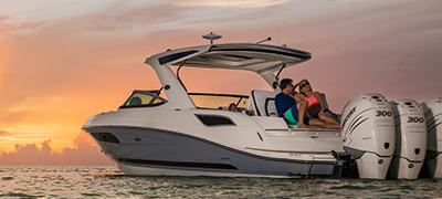 people on aft deck seating while the sun is setting