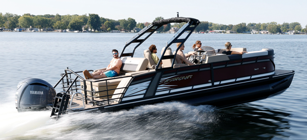 A starcraft SX series pontoon on the water