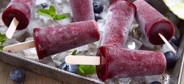 Purple popsicles in cooler
