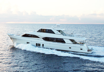 large charter yacht moving elegantly across waters