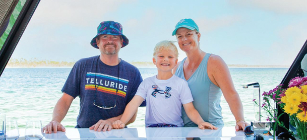 Family smiling on Galeon Yacht