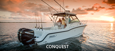 boston whaler conquest in still water with sunset