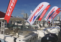 row of boats lined with marinemax banners