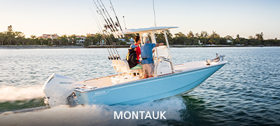 boston whaler montauk in water with fishing poles