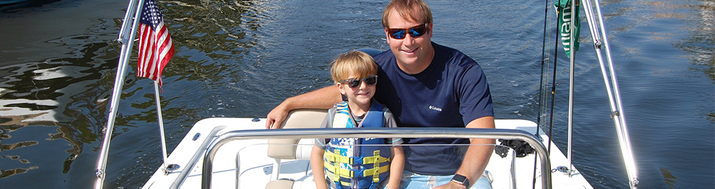 Father and son on boat