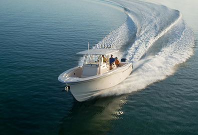 Grady White fishing boat cruising through water