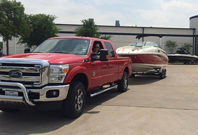 Keever family truck towing their sport boat
