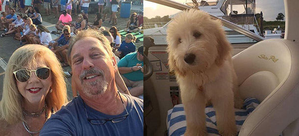 On left, man and woman smile for selfie. On right, a dog stands at helm of boat