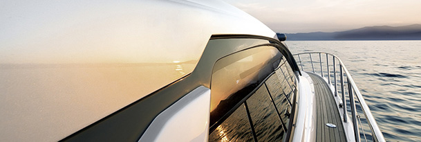 a close up starboard shot of the azimut atlantis 45  as the sun reflects off the glass