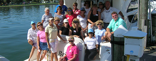 people on the back of a  boat