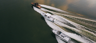 Various boat types cruising