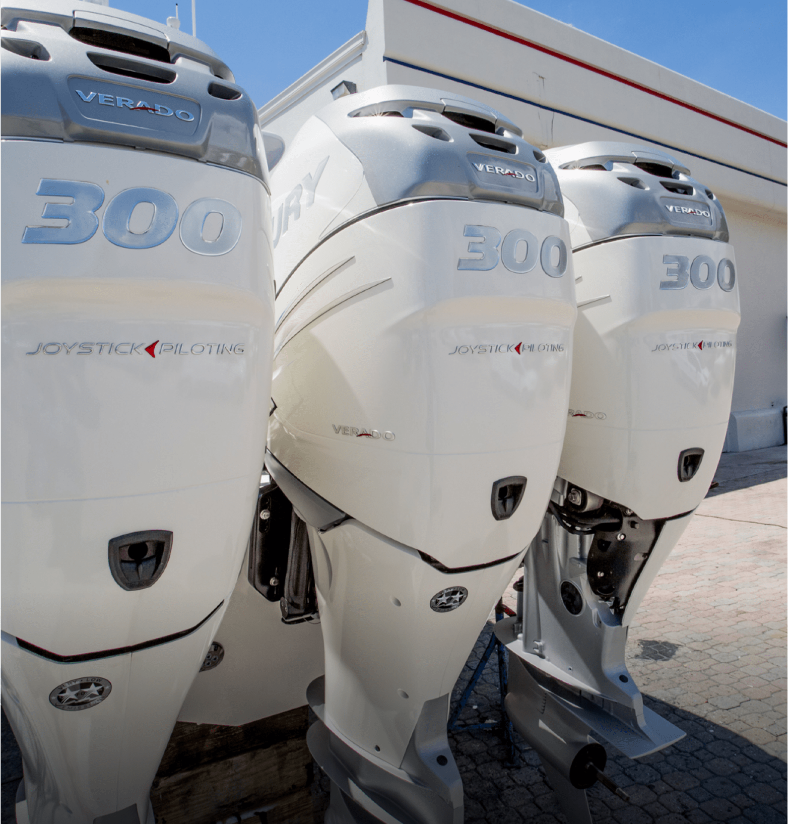Three outboard boat engines