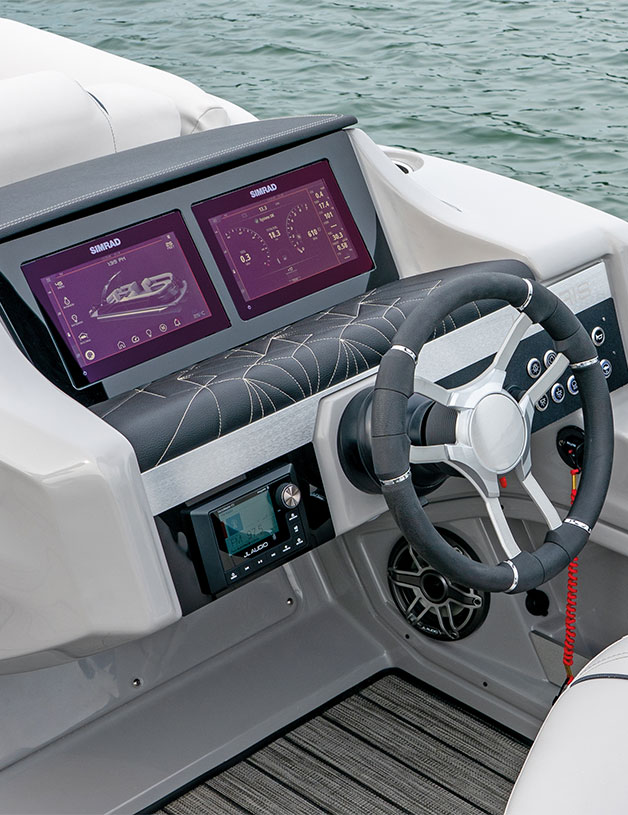 technology dashboard on helm of boat