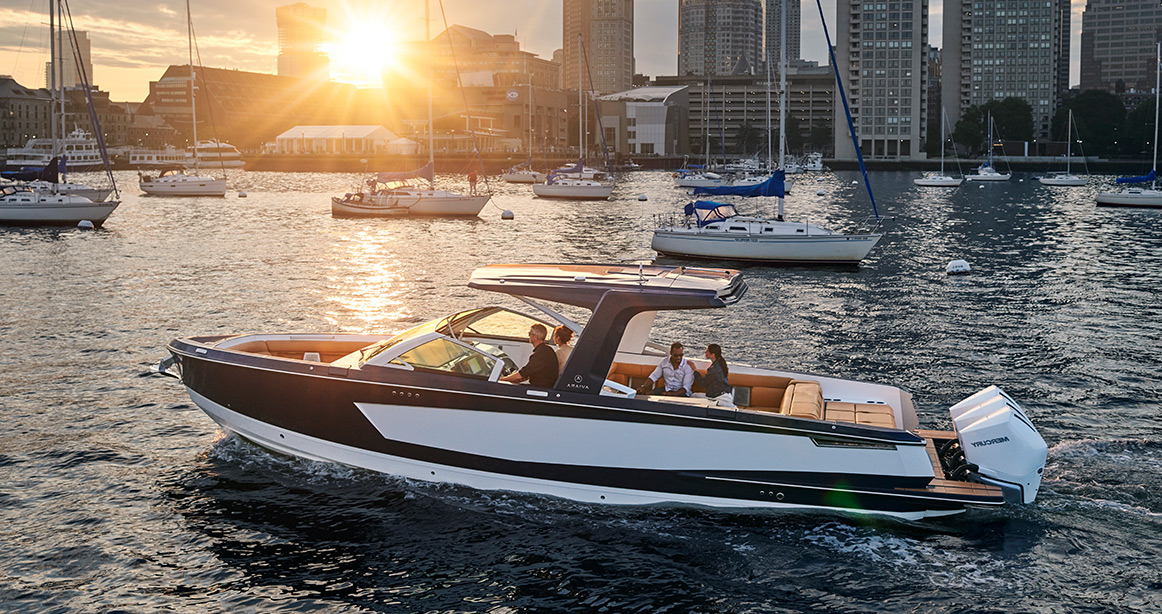 Aviara boat out on the water during a sunset