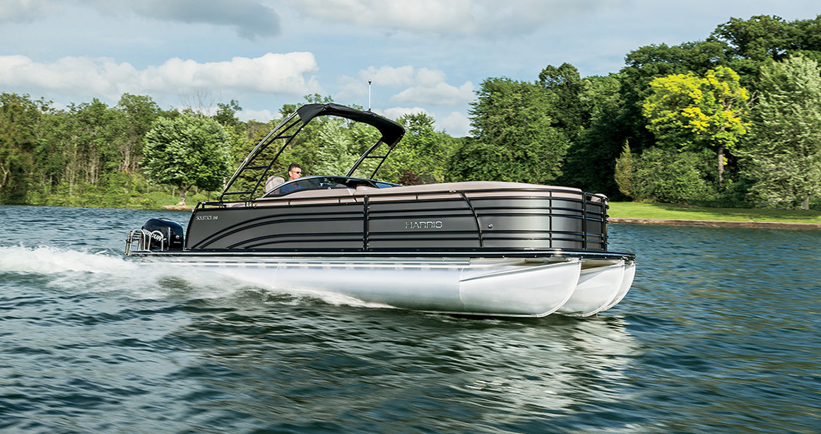 Harris pontoon boat out on the water