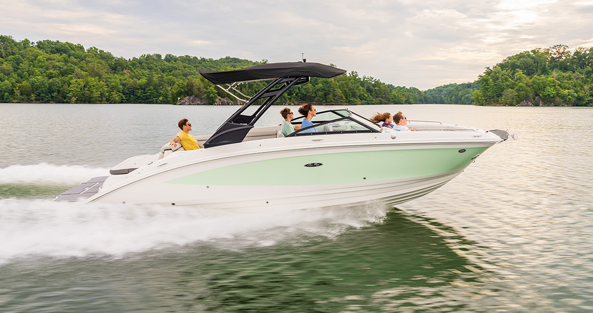 Green Sea Ray cruiser boat out on the water
