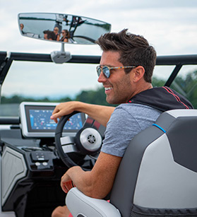 A man driving a Yamaha boat