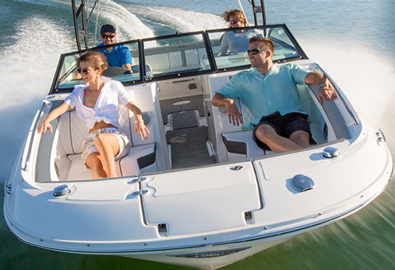 group on sport boat cruising across water