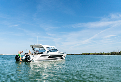 Couple having fun on the back of a Aquila 36 Joystick