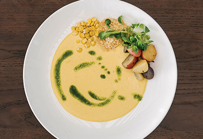 yellow corn bisque in bowl