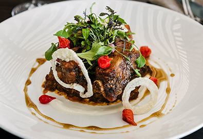 pork rib dinner on white plate