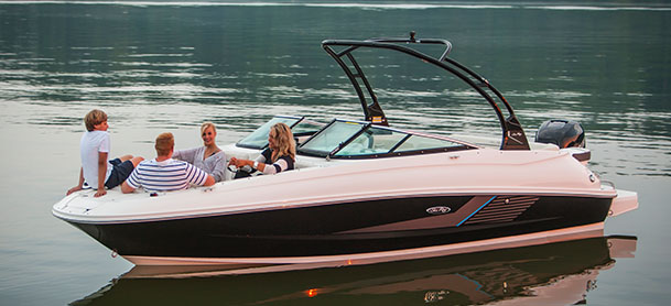Boat anchored and people on board relaxing