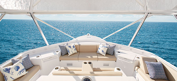 A white, clean, and organized boat deck