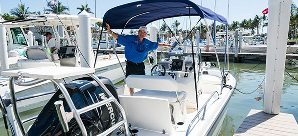 Man on board of a docked boat