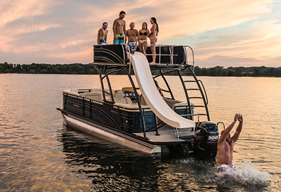 A group of people aboard an anchored pontoon