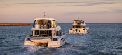 Two Aquila Power Catamarans out on the water