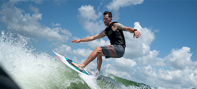 Man surfing on a wakesurf board