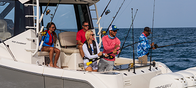 Couples fishing in the ocean