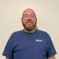 Headshot of TJ Hansbury