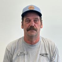 Headshot of James Thomas