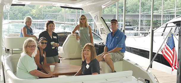 MarineMax Lake Ozark educational program Women on Water, women on board of a white boat