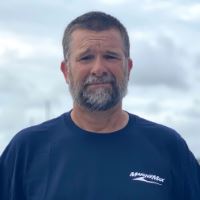 Headshot of John Hayes