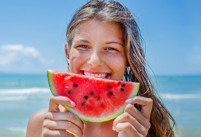 girl holding watermelon