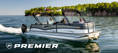 A Premier Pontoon boat moves across a body of water