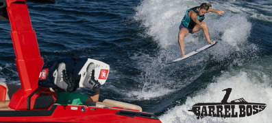 Person wake surfing and Barrel Boss logo