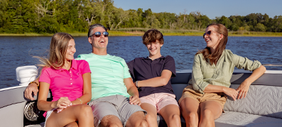 Family sitting on a boat