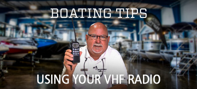 Captain Keith holding a VHF Radio in the hand