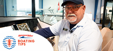 Captain Keith at the helm of a boat