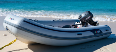 A picture of a yacht tender on the beach