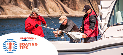 Men boating with jackets