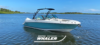 Boston Whaler blue and white model on the water 