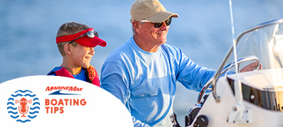 A father and son sharing a boating moment