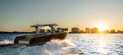 Aviara boat on the water at sunset