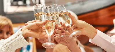 boaters toasting with wine glasses
